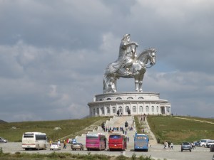 After an hour and a half of racing along dirt roads paralleling the highway still under construction or in dire need of repair, we reach the statue!