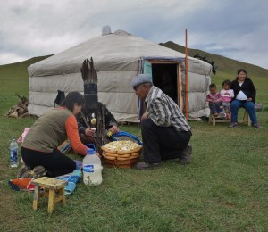 Family members gather to watch.