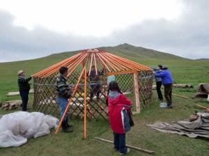 The family works with incredible efficiency to take down the ger erected earlier that day for the ceremony. 