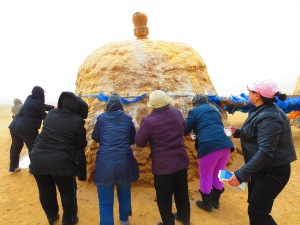 A famous shrine, specifically for women hoping to become or already pregnant, this double stupa is intentionally shaped liked gigantic breasts. Women make offerings of milk in the windy morning.