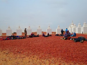 Laying on their backs, Mongolians soak up the natural healthful energy believed to be emanating from the earth itself. I tried it too!