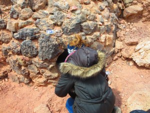 A tight squeeze; a "birthing canal" through which visitors crawl and are "reborn." Those who crawl through before and after you are believed to be your "spiritual brothers and sisters!"