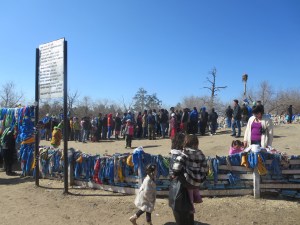 People are lined up for the original (Grand?)Mother Tree, that was burned down by the Soviets many years ago. Only the stump remains but it's even more popular than the current Mother Tree.