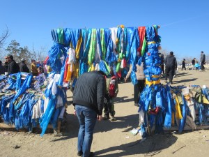 To show respect as one leaves he or she is supposed to back out and bow his or her head, like in a monastery.