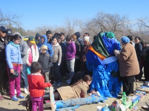 Three generations pay homage to the elder mother tree! Wearing a "dell" and several layers of prayer flags, this is probably one of the world's most popular tree stumps!