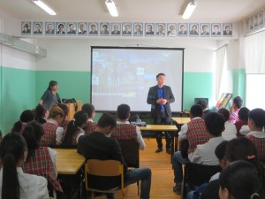 Looking dapper, Ideruugan tells students about his personal story of growing up in a herding family and eventually earning a coveted scholarship to study English in the US.